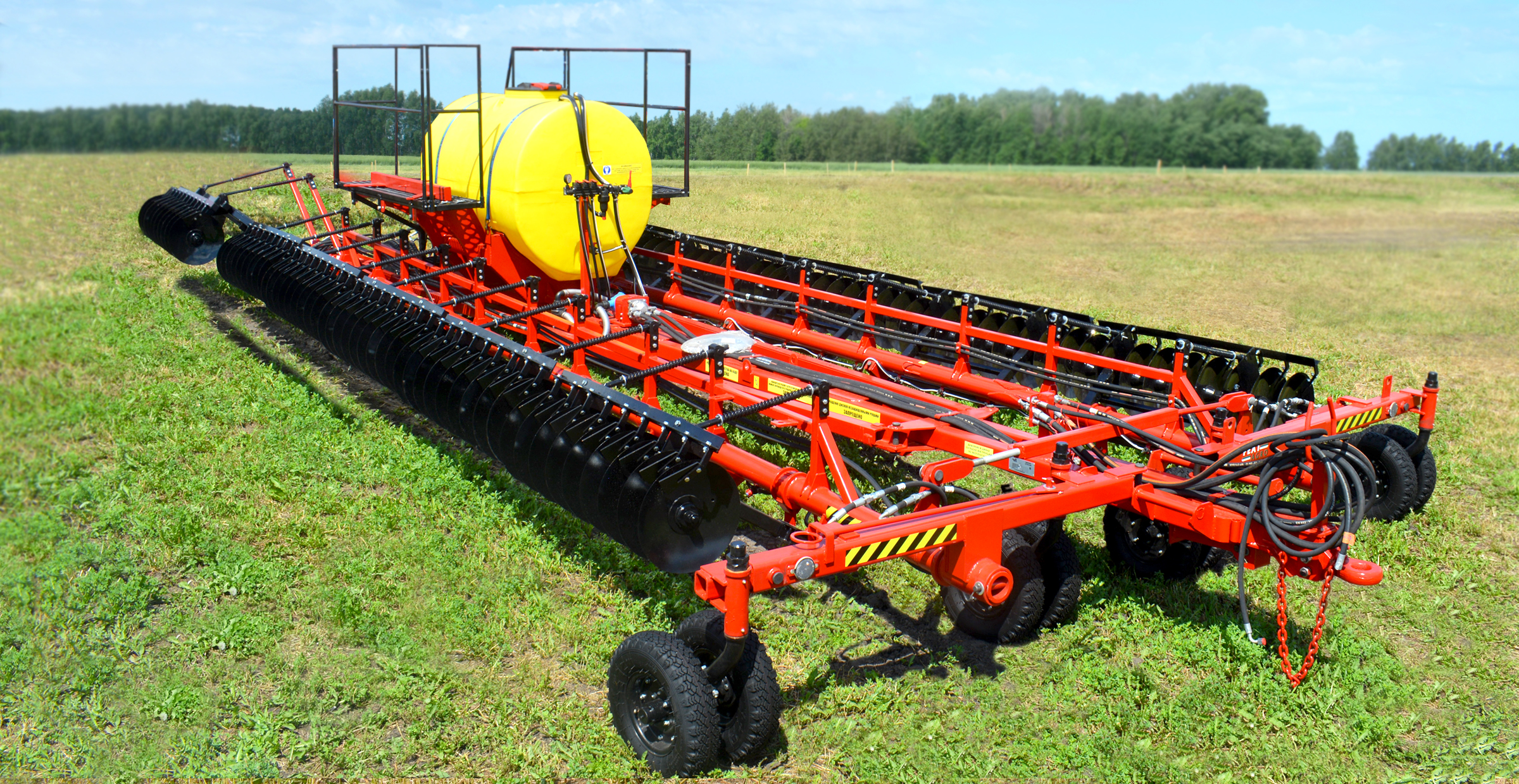 Liquid herbicide distribution systems for tillage equipment